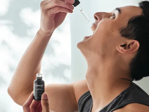 man using a CBD tincture for anxiety